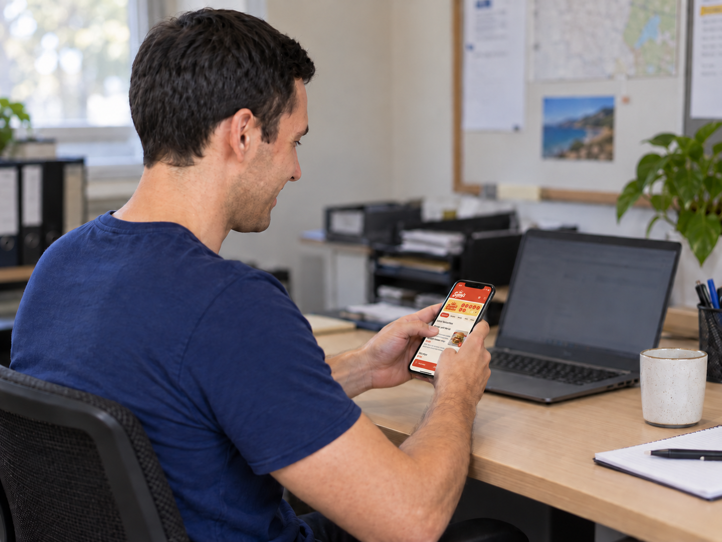Illustrative customer ordering Sunny’s takeaway on his phone at work
